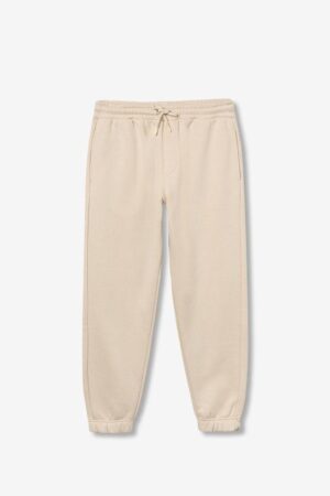 Jogging beige Tiffosi ado garçon, coupe relax, 100% coton, petit logo discret, disponible du XXS au L. Idéal pour l’Automne-Hiver 2025. Confort et style pour les jeunes garçons