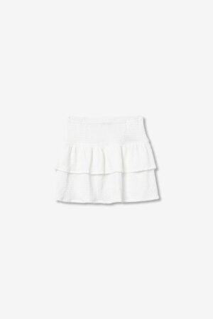 Jupe courte blanche à volants pour ado fille Tiffosi, tissu mousseline gaufrée et taille élastique, collection printemps été 2026 boutique Casual Sénas.