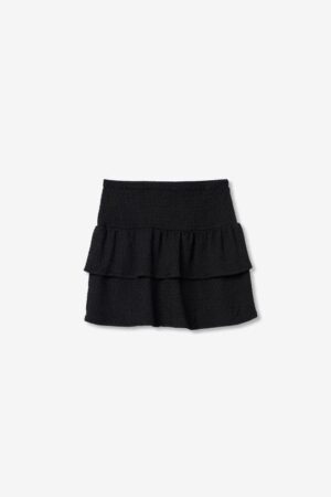 Jupe courte noire à volants pour ado fille Tiffosi, tissu mousseline gaufrée et taille élastique, collection printemps été 2026 boutique Casual Sénas.