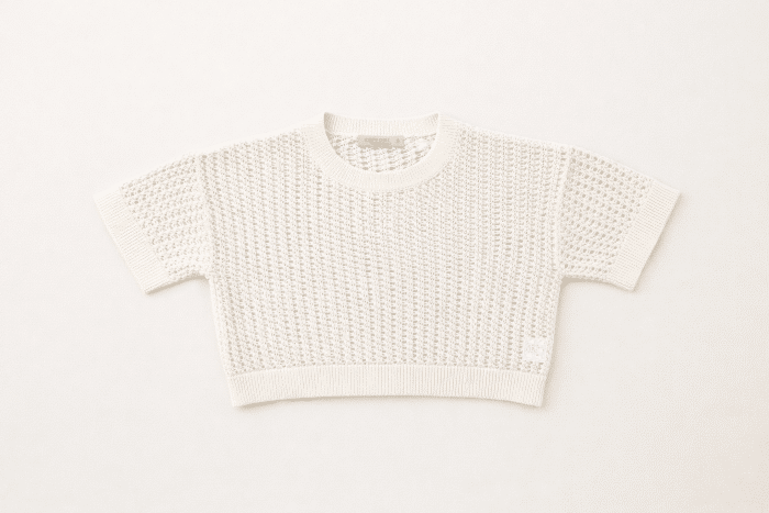 Pull femme Tiffosi blanc cassé/beige en maille ajourée, manches courtes, 100% coton naturel, collection printemps-été 2026 Casual Sénas.