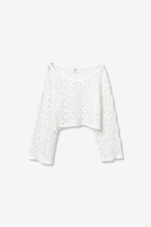 Blouse blanche ado fille Tiffosi en dentelle circulaire ajourée, manches longues évasées, collection TYW printemps-été 2026 Casual Sénas.