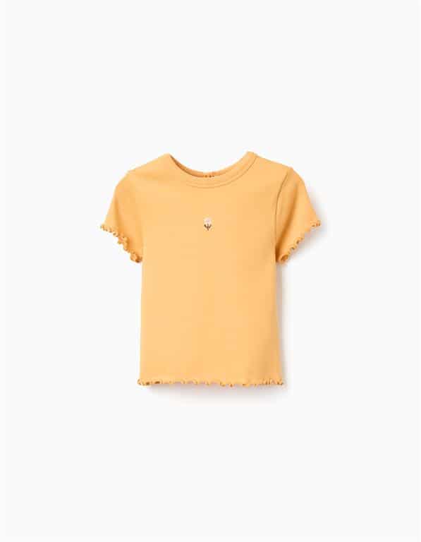 T-shirt à manches courtes jaune pastel pour bébé fille Zippy, matière côtelée avec bordure froufrou et motif fleur, collection 2026 boutique Casual Sénas.