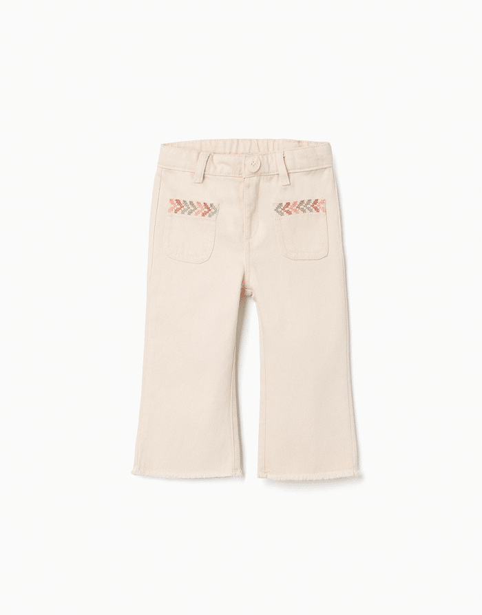Pantalon évasé en sergé de coton beige pour bébé fille Zippy, broderies au point de croix et ourlets effilochés, collection 2026 boutique Casual Sénas.