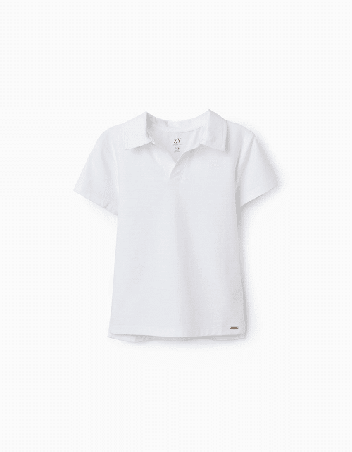 Polo blanc à manches courtes pour garçon Zippy, texture jacquard originale et col en V sans boutons, 100% coton, collection 2026 boutique Casual Sénas.