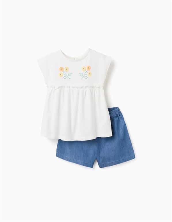 Ensemble deux pièces bébé fille Zippy, short en coton bleu aspect jean et blouse blanche à motifs, collection printemps-été 2026 boutique Casual Sénas.