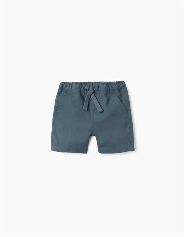 Short léger pour garçon en lin et coton bleu avec taille élastiquée et cordon de serrage, marque Zippy, disponible chez Casual Sénas.
