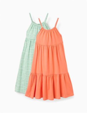 Lot de deux robes d'été pour fille de la marque Zippy, une robe corail uni et une robe verte imprimée, 100% coton, disponibles à la boutique Casual Sénas.