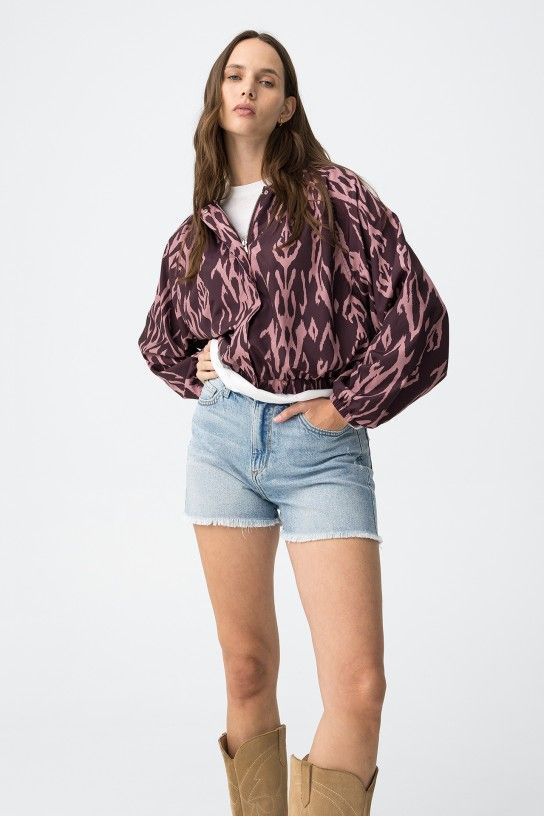 Short jean bleu clair femme Tiffosi BABSY64 coupe regular confortable avec ourlet effiloché discret idéal été mode Sénas France